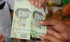 Alertan por billetes falsos