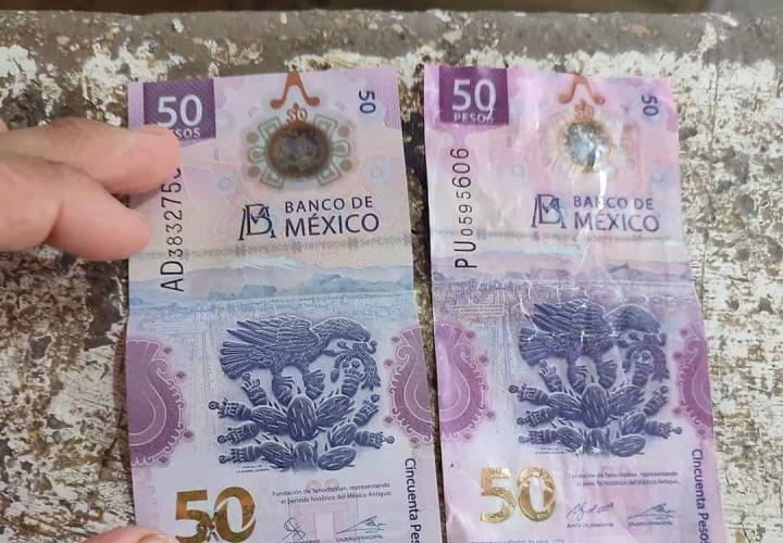 Alertan por billetes clonados