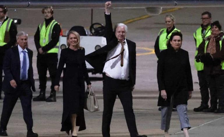 Assange sale libre, regresa a Australia 